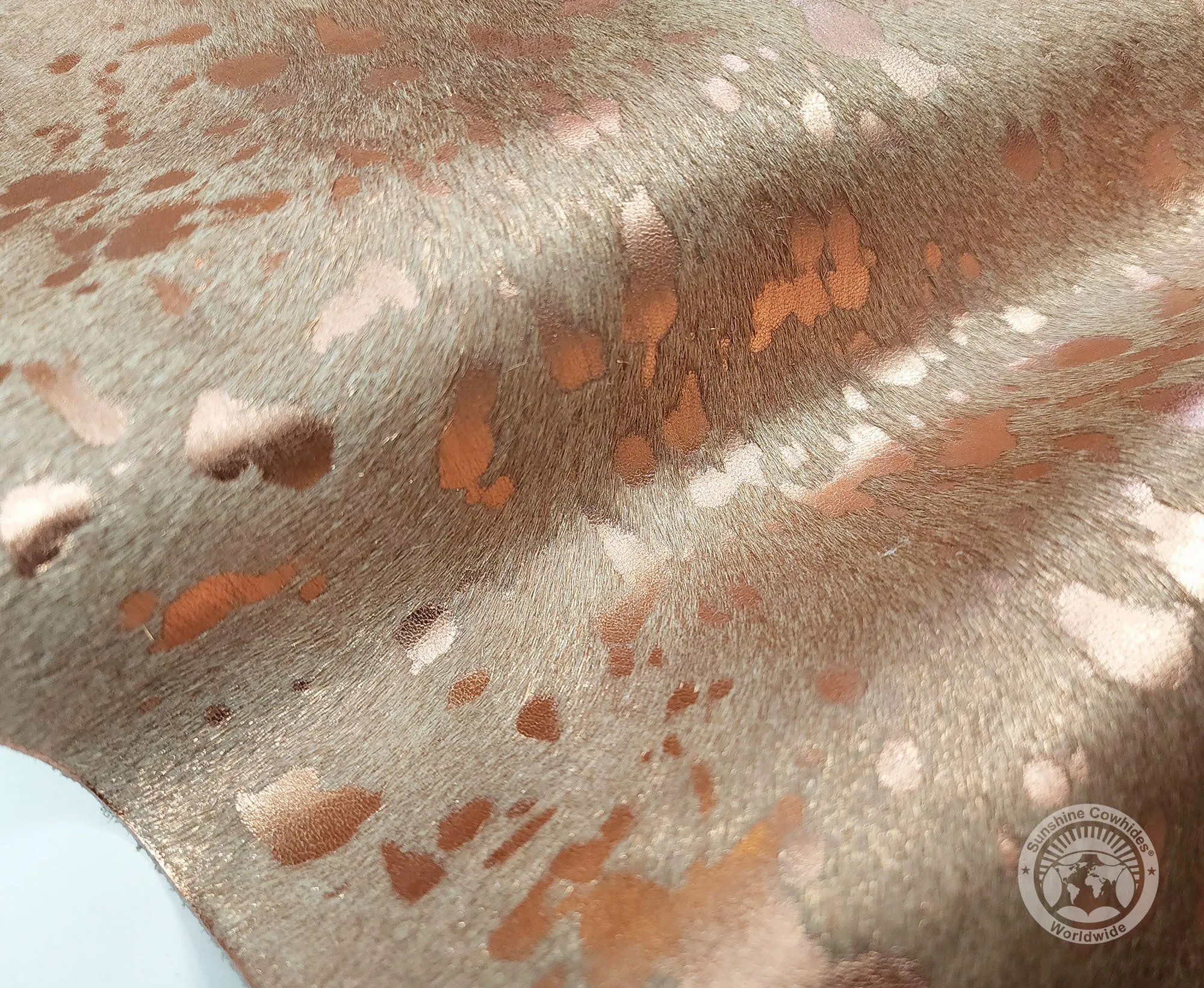 Devore Metallic Rose Gold on Off White Cowhide Rug