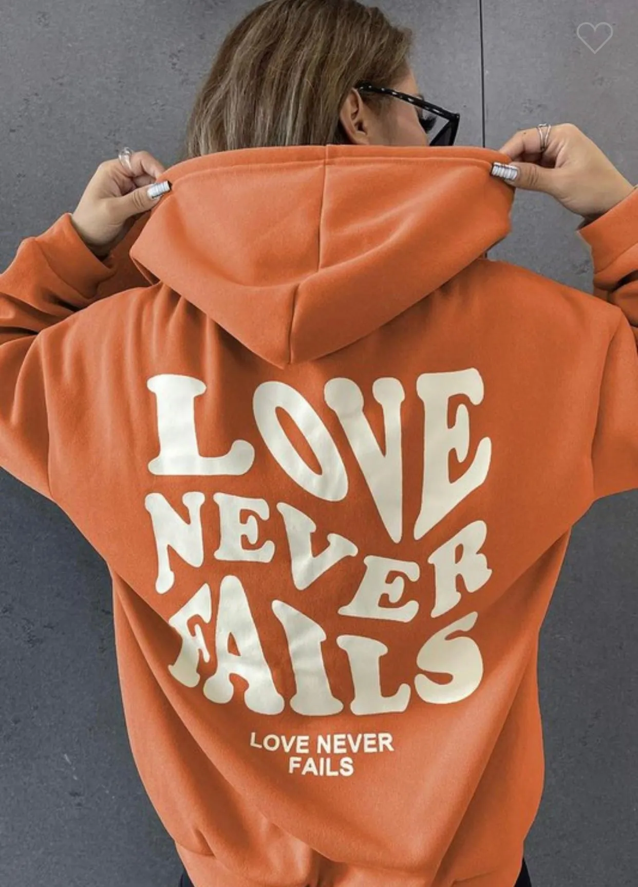 "Love Never Fails" Graphic Hoodie